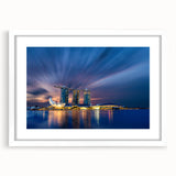 Abstract art print of Singapore skyline in muted gray and blue tones on a framed white mat, suitable for dining room decor.