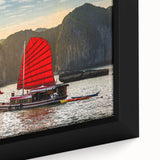 Close-up of a framed canvas featuring a black textured art scene with colorful Vietnamese landscape.
