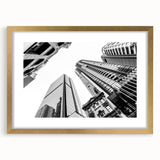 Textured abstract art print of Brisbane skyline in muted gold and blue tones on a framed canvas, ideal for bedroom art.