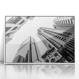 Framed acrylic print of Brisbane skyline in mid-century modernist style with muted blue and gray tones.