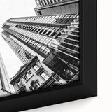 Extra large black wall art featuring a textured Brisbane skyline on a framed canvas, with colorful art accents.