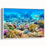 Framed canvas depicting the Great Barrier Reef in a vintage poster style with vibrant blues and greens.