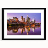 Extra large abstract art print of a colorful Melbourne skyline in vibrant hues on a textured canvas.