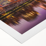 Art deco poster of Melbourne skyline in muted gray and blue tones on rolled canvas, suitable for dining room wall art.