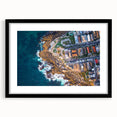 Colorful abstract art print of Sydney scenery on a large textured canvas, framed in black, suitable for living room decor.