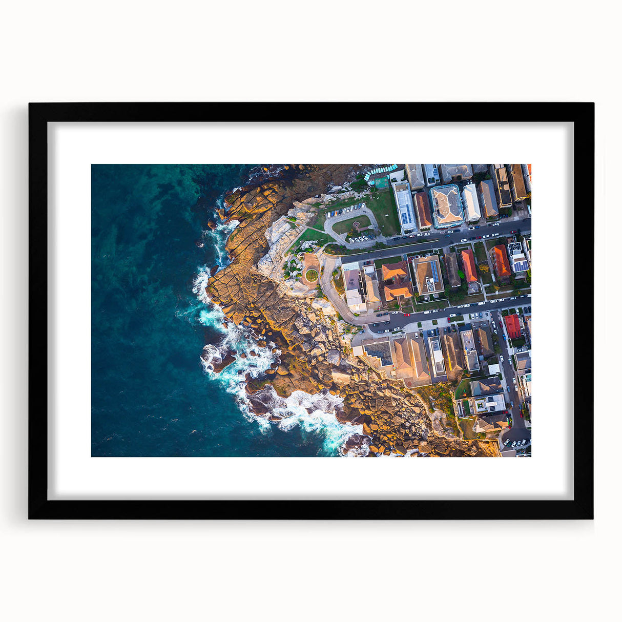 Colorful abstract art print of Sydney scenery on a large textured canvas, framed in black, suitable for living room decor.