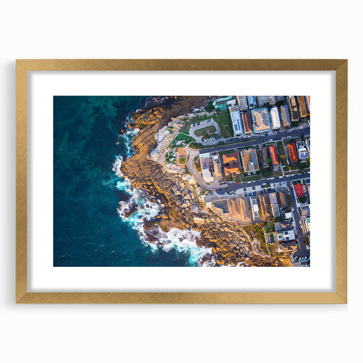Abstract art print of Sydney skyline in muted blue and orange tones on a framed canvas, suitable for dining room decor.