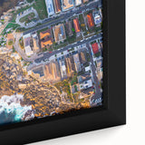 Extra large framed canvas of a textured Sydney skyline in black with colorful accents, ideal for living room decor.