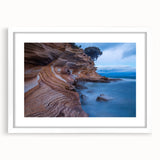 Extra large abstract art print of Tasmania scenery in muted earth tones on a textured canvas, framed in white.