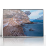 Large art print of a Tasmanian landscape in muted green and blue tones, framed in white acrylic.