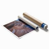 Rolled print of Tasmanian landscape with floral foreground in soft blue and green tones.