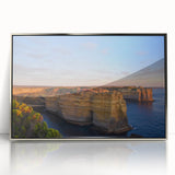 Large art print of an Australian landscape in muted earth tones on a silver-framed acrylic.