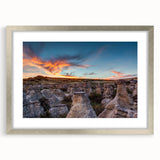 Textured abstract art print of Alberta scenery in muted earth tones on a framed canvas, suitable for bedroom decor.