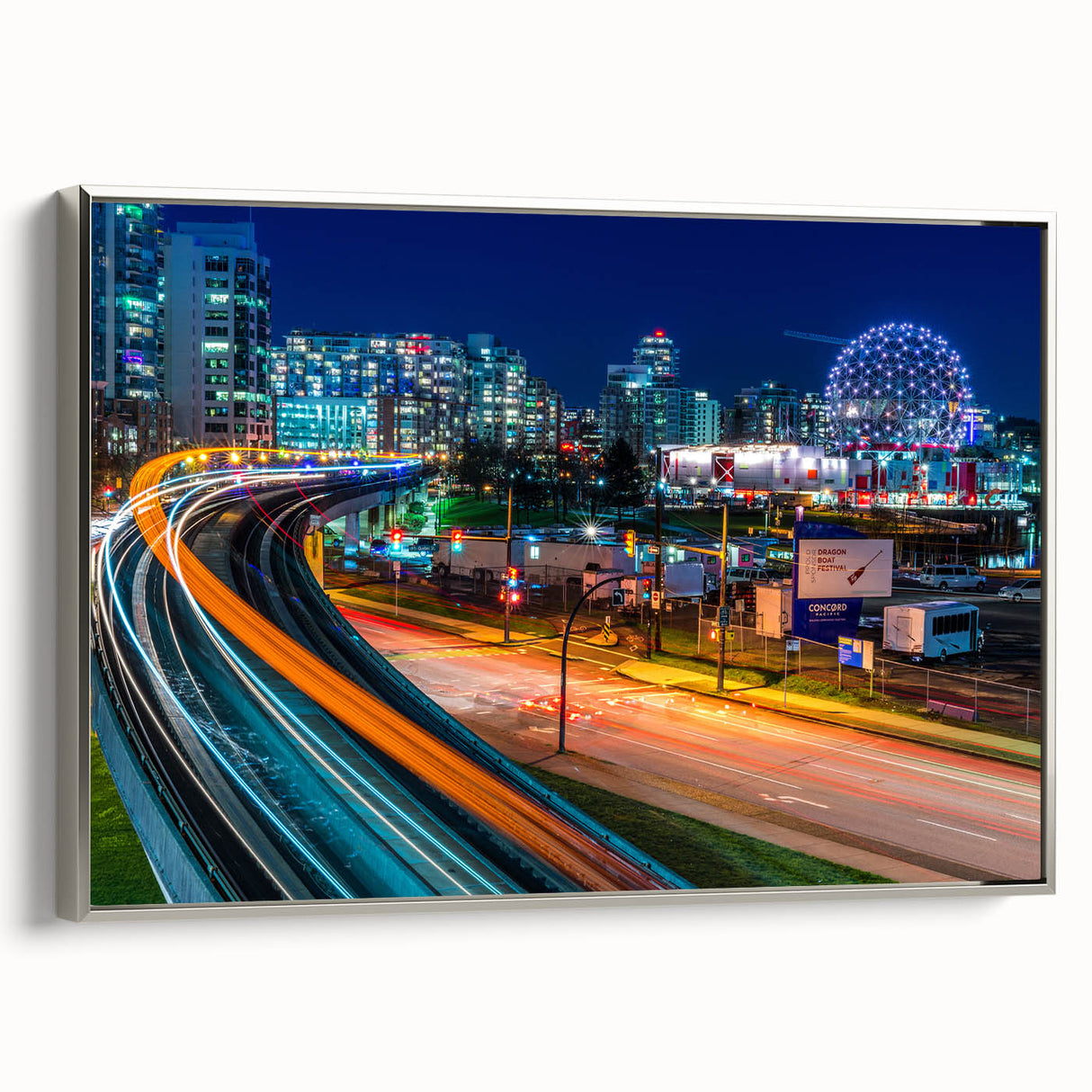 Framed canvas landscape art painting of British Columbia, featuring muted earth tones and silver frame.