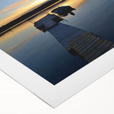 Art deco poster of Northwest Territories scenery in muted gray and blue tones on rolled canvas.