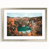 Textured abstract art print of a Nova Scotia landscape in muted earth tones, framed in silver, suitable for bedroom decor.