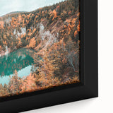 Close-up of a textured black wall art featuring a colorful Nova Scotia scenery on a framed canvas.