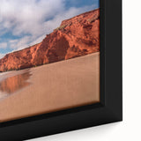 Extra large framed canvas depicting a textured, colorful abstract scene, using a black-dominated palette.