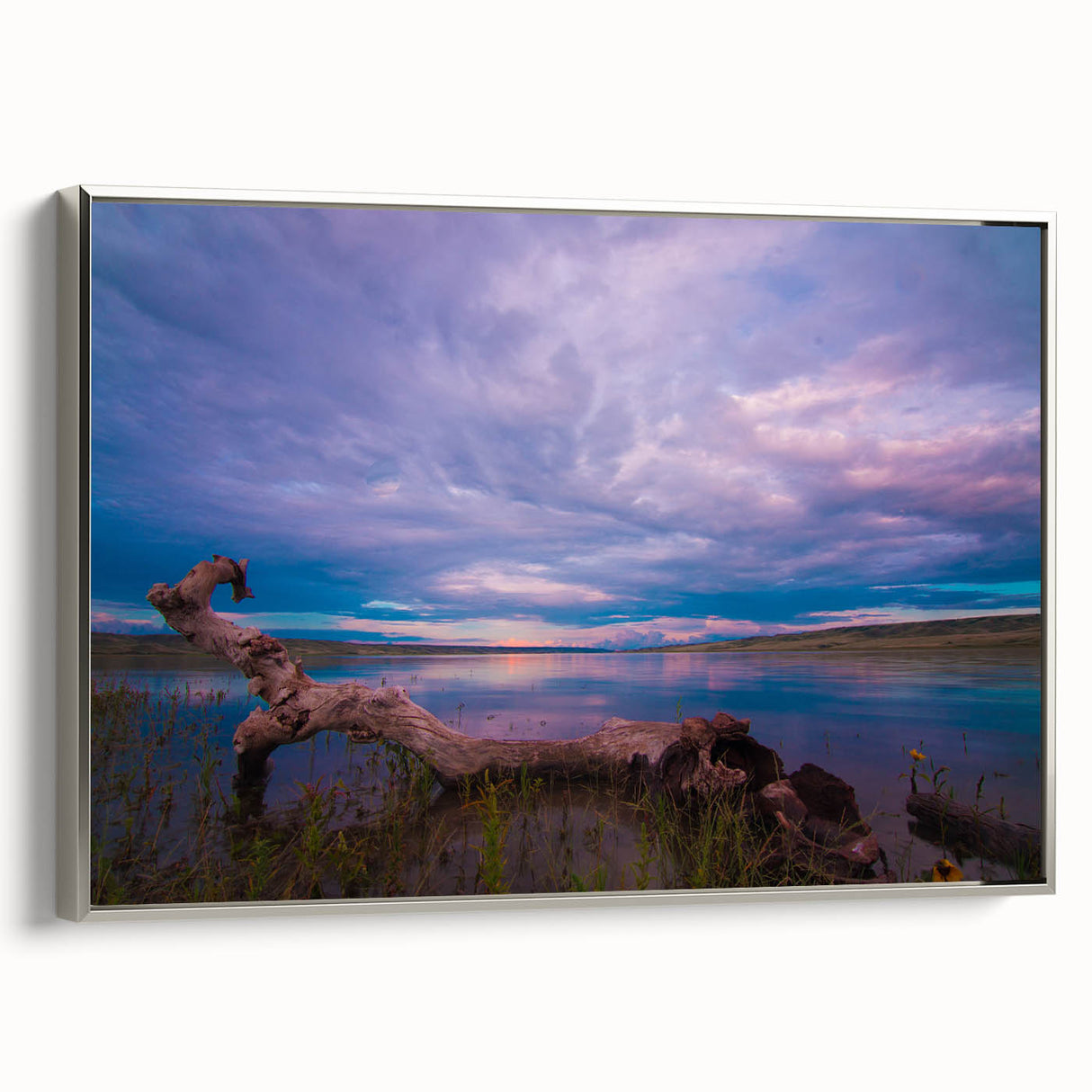 Framed canvas featuring a vintage-style landscape painting of Saskatchewan, with vibrant green and blue tones.