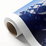 Art deco style poster of Yukon scenery on rolled canvas, in cool blue and green tones, ideal for nursery wall art.