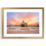 Abstract art print of a Caribbean seascape in soft blue and white tones on a framed canvas, suitable for dining room decor.