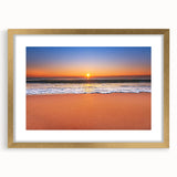 Abstract art print of a Caribbean seascape in muted blue and green tones on a framed gold mat, ideal for dining room decor.