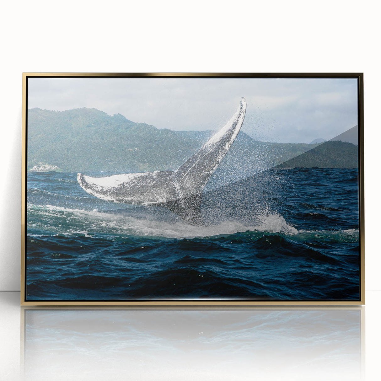 Art deco poster of a Caribbean scene with lush greenery and blue skies on a gold-framed acrylic.