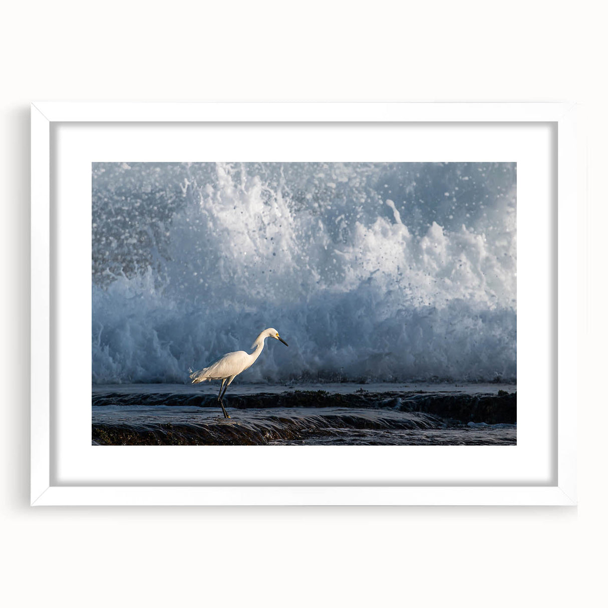 Textured abstract art print depicting a Caribbean landscape in muted blue and green tones, framed with a white mat.