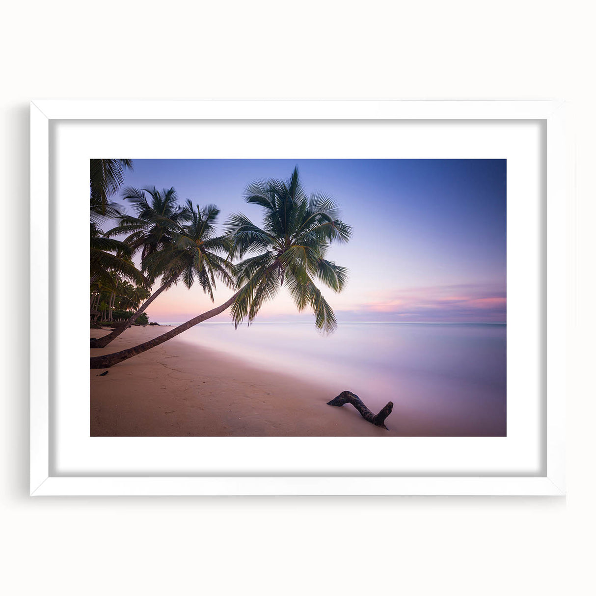 Textured art print of an abstract Caribbean scenery in muted blue and green shades, framed in white, ideal for bedroom art.