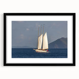 Extra large, colorful abstract art print of a Caribbean scene in a black frame, ideal for living room decor.