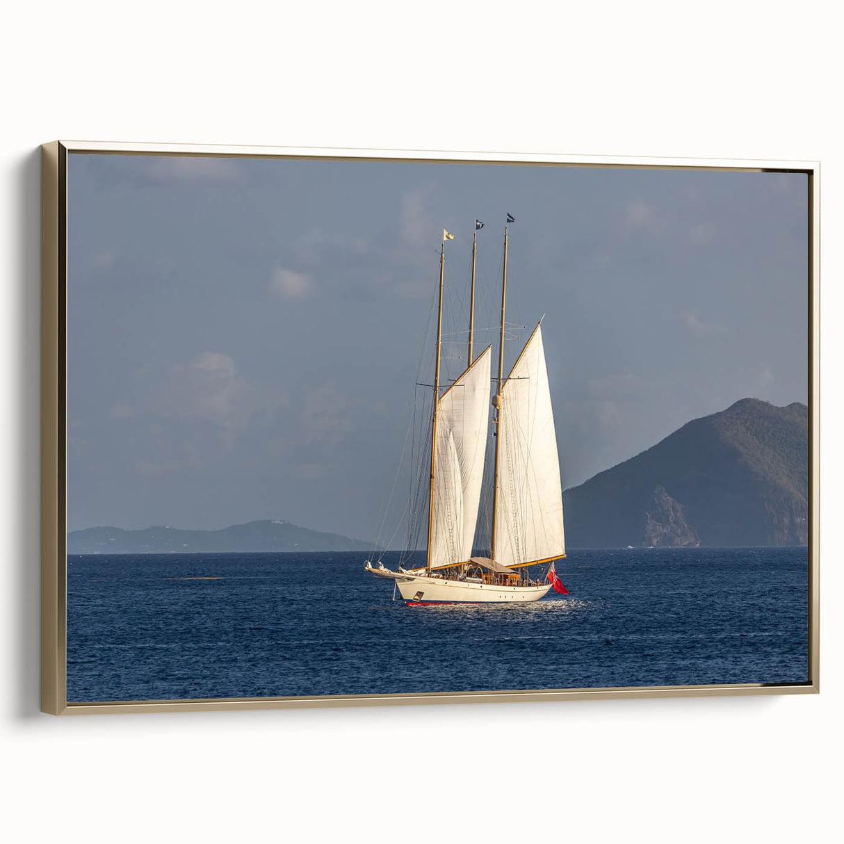 Framed canvas wall art depicting a vintage-style Caribbean landscape in muted gold and black tones.