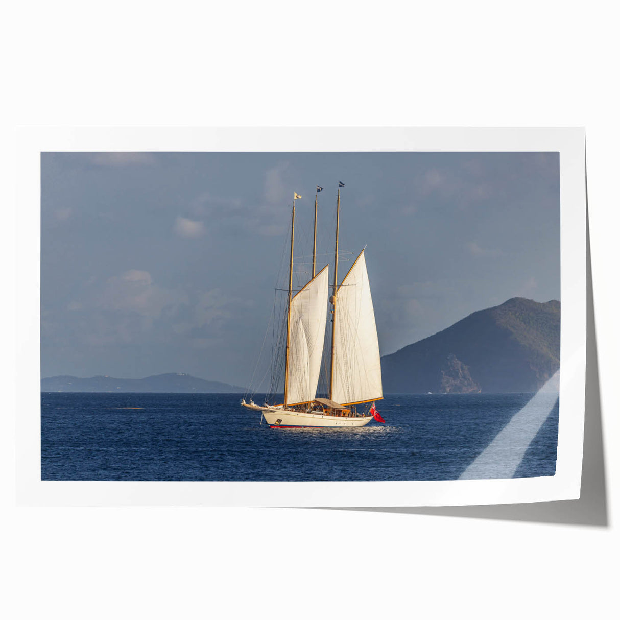 Rolled print of a Caribbean Saint Vincent scenery with lush green foliage and blue ocean, suitable for art wall dining room.