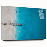 Large abstract wall art of Caribbean scenery in vibrant blue and green hues on acrylic glass.
