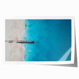 Extra large rolled print of a Caribbean beach with vibrant blue and green tones, ideal for dining room wall art.