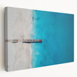 Large stretched canvas featuring a serene Caribbean beach scene with vivid blue and turquoise tones.