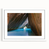 Textured abstract art print of Caribbean Virgin Islands in muted blue and green tones, framed with a white mat.