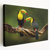 Side view of a stretched canvas depicting a Central American landscape in rich green and blue tones.