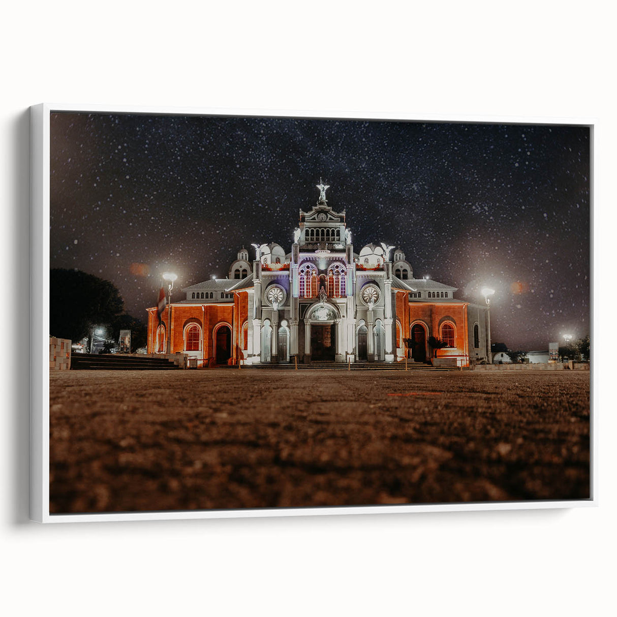 Vintage poster art of a Costa Rican landscape on a framed canvas, featuring colorful art and black accents.