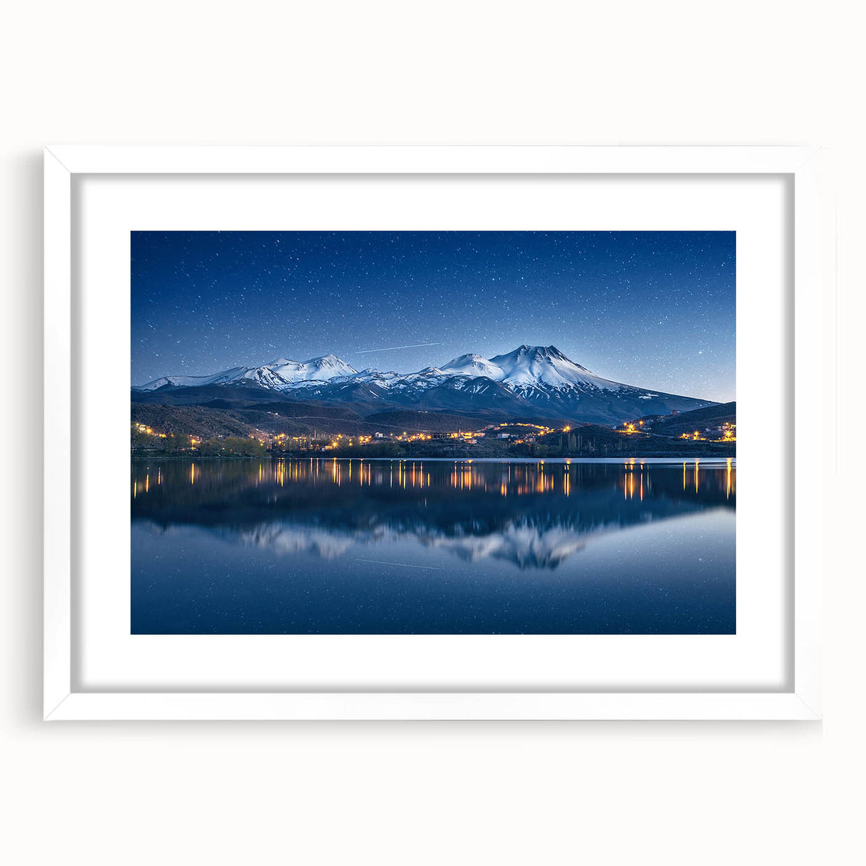 Abstract art print depicting a vibrant, colorful Central American scenery on a framed white matte canvas.