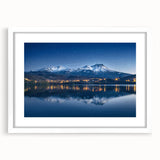 Abstract art print depicting a vibrant, colorful Central American scenery on a framed white matte canvas.