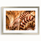 Textured abstract art print of Central American scenery in muted earth tones, framed in silver, ideal for bedroom art.