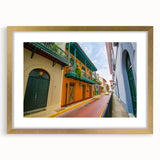 Extra large abstract art print of Central American scenery in gold frame, featuring textured design and vibrant colors.