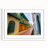 Abstract art print of a vibrant Central American landscape on a white-framed canvas, ideal for dining room decor.