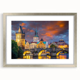 Textured art print of Prague skyline in abstract style, soft gray and blue tones, framed in silver.