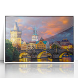 Framed acrylic print of Prague with pastel shades, ideal for modern art wall decor in a nursery.