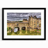 Colorful abstract art print of a European scenery in vibrant hues on a textured, framed canvas, ideal for living room decor.