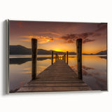 Framed canvas featuring a vintage-style landscape painting of the Cumbrian countryside in muted earth tones.