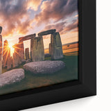 Close-up of black wall art featuring a textured depiction of Stonehenge on a framed canvas, ideal for living room decor.