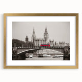 Abstract art print of the Thames River in muted blue and gray tones, framed in gold, suitable for dining room decor.