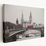 Large art print of the Thames River in England, featuring muted blue and gray tones on stretched canvas.